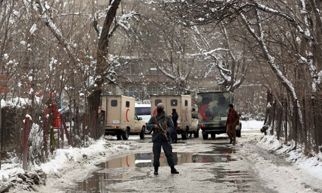 Security forces stand