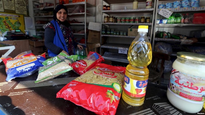 A worker sells subsidized
