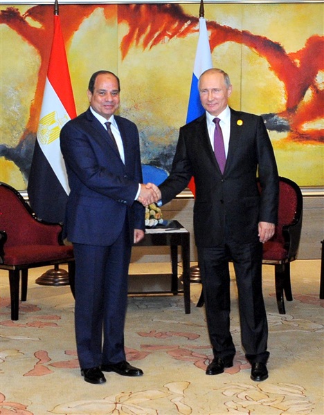 President Sisi shakes